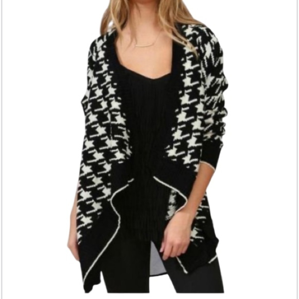 - Black and white open cardigan